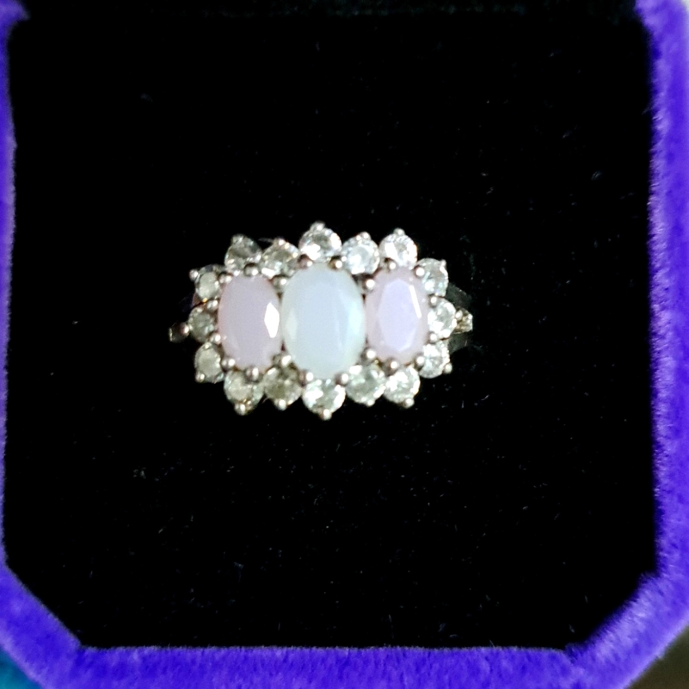 A beautiful 3 stoned rose quartz ring.